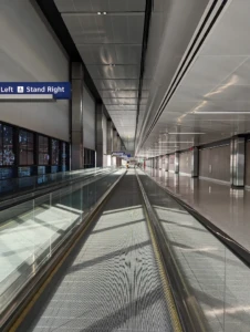 Pasillo con caminadora móvil y señalización direccional